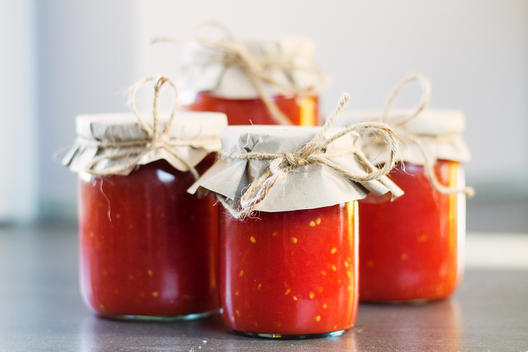 Jars of canned tomatoes