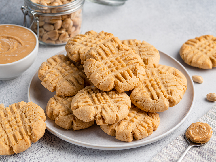 Plate of stacked peanut butter cookies